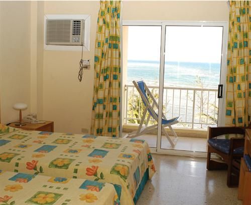 'Hotel - Costasur - room' Check our website Cuba Travel Hotels .com often for updates.